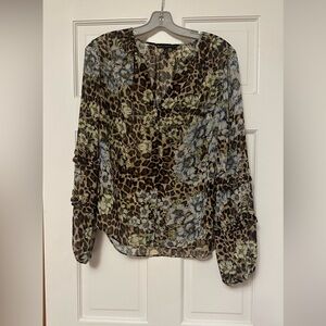 Beautiful animal print and flowers blouse.